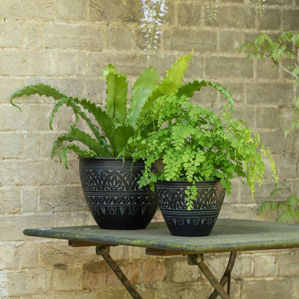 Traditionally etched black pot 