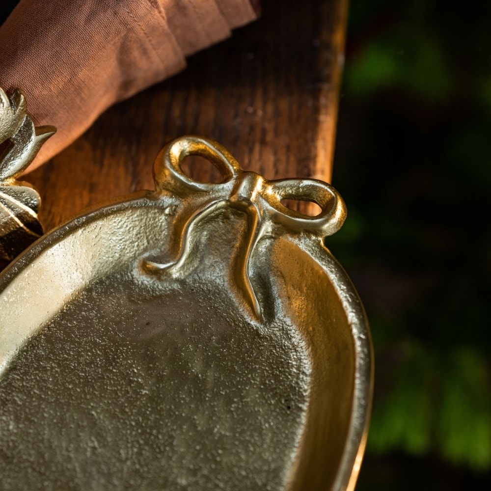 Gold bow plate