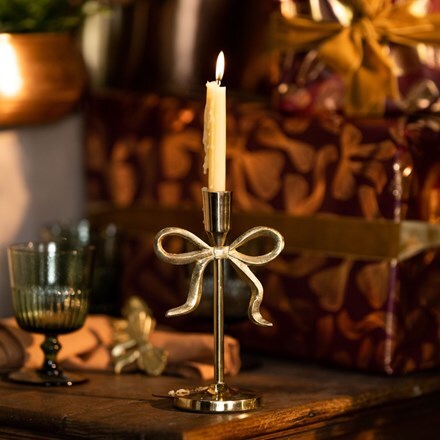 Gold bow candle holder