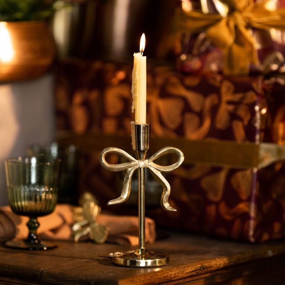 Gold bow candle holder