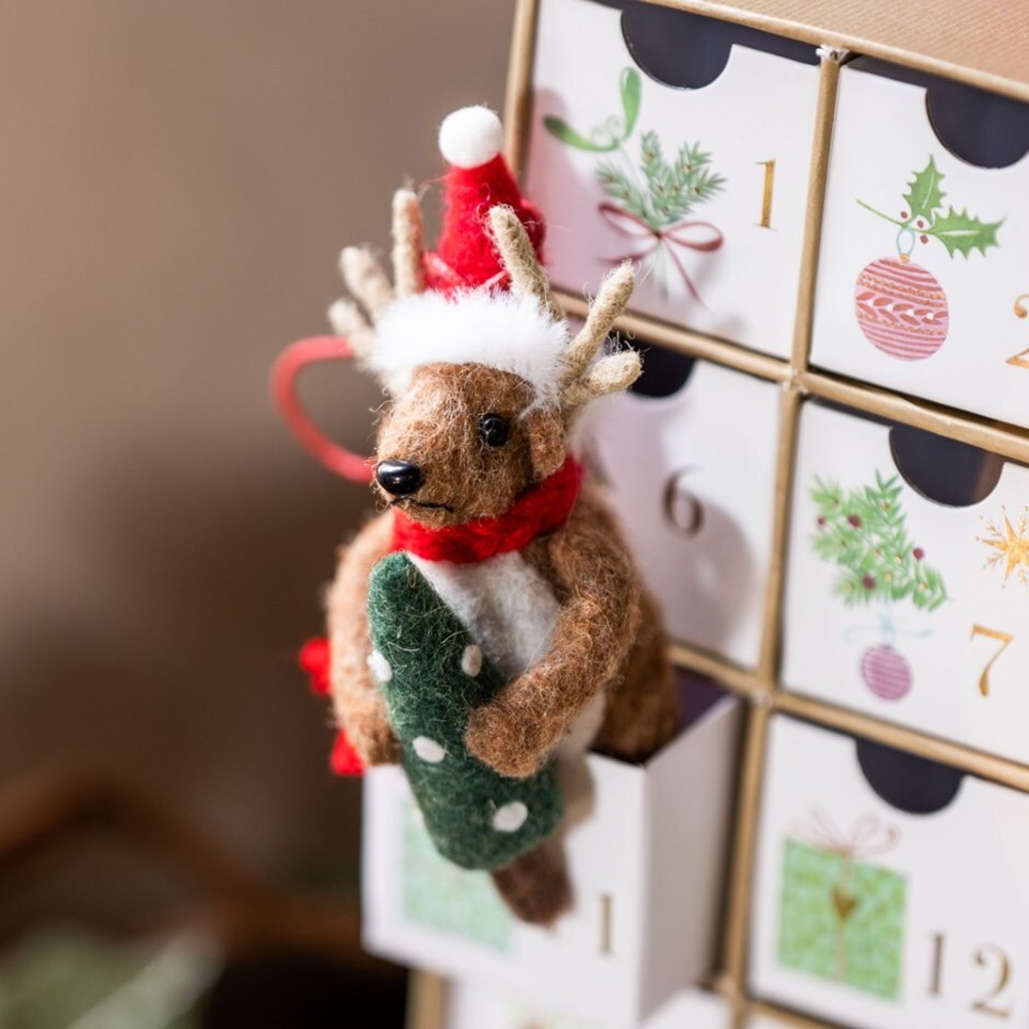 Felt reindeer with tree