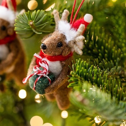 Felt reindeer with present