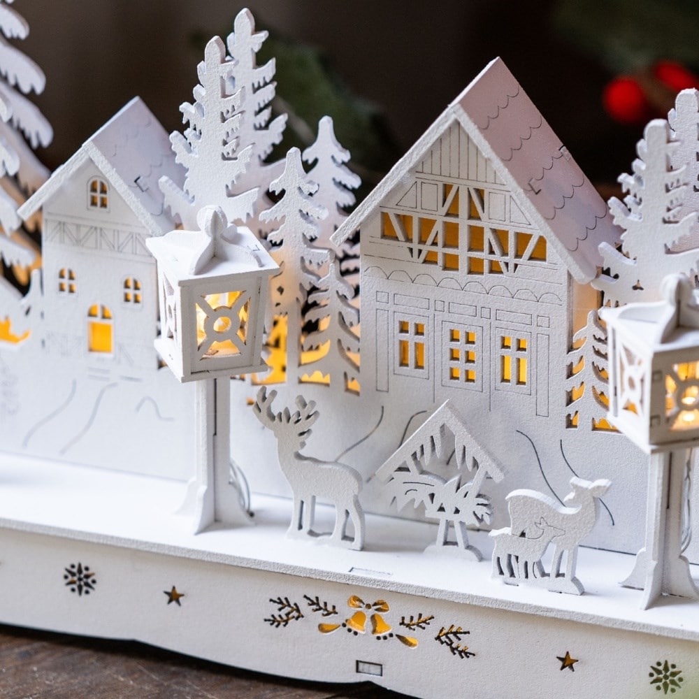 White wooden lit village
