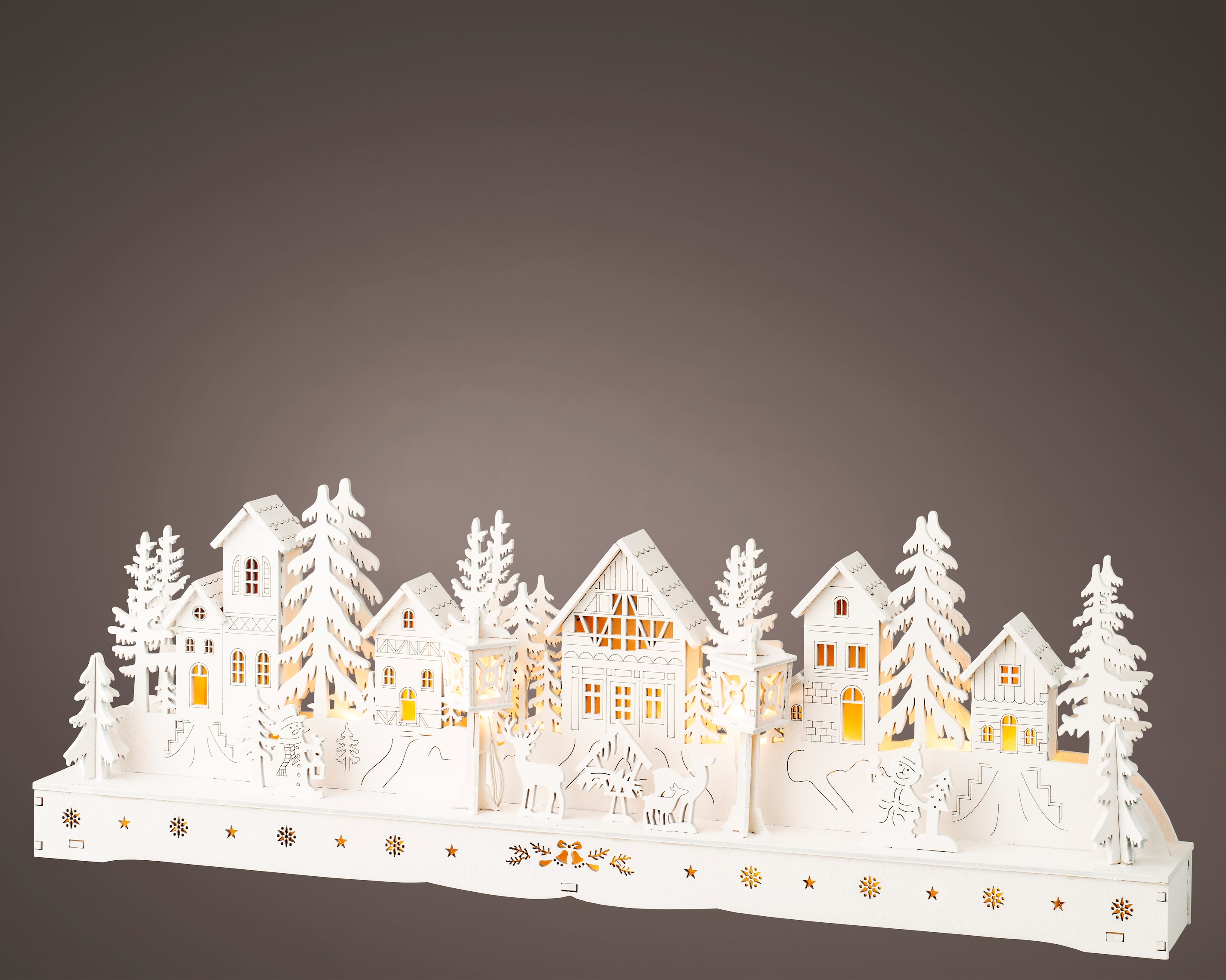 White wooden lit village