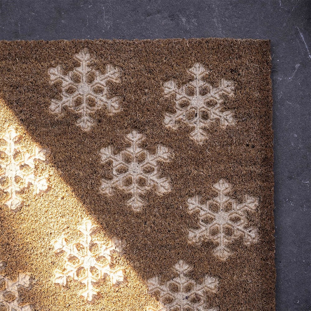 Embossed snowflake doormat
