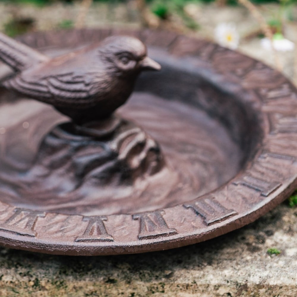 Cast iron bird bath with sundial
