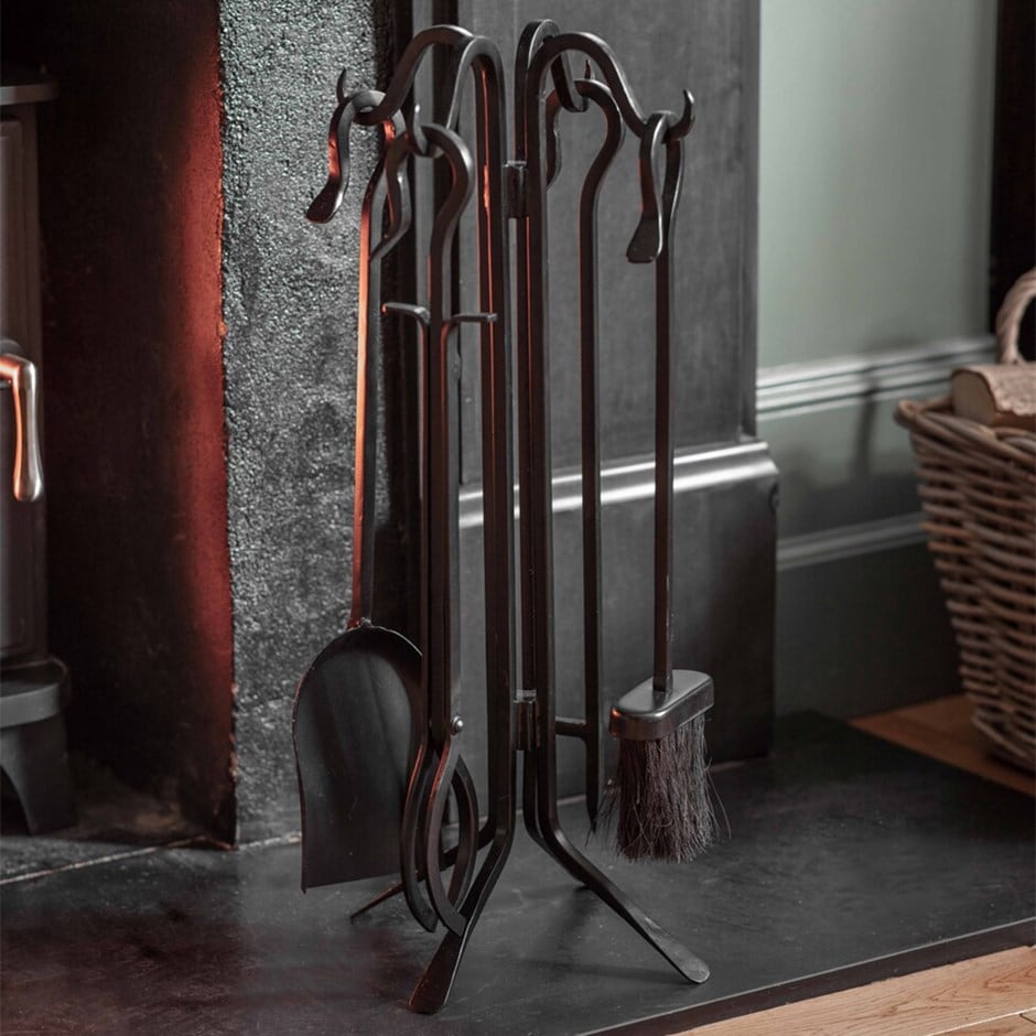 Four piece iron fireside tool set