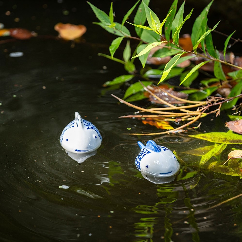 Pair of floating porcelain fish