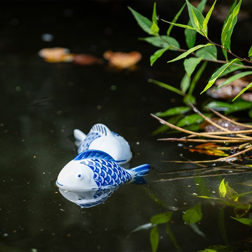 Pair of floating porcelain fish