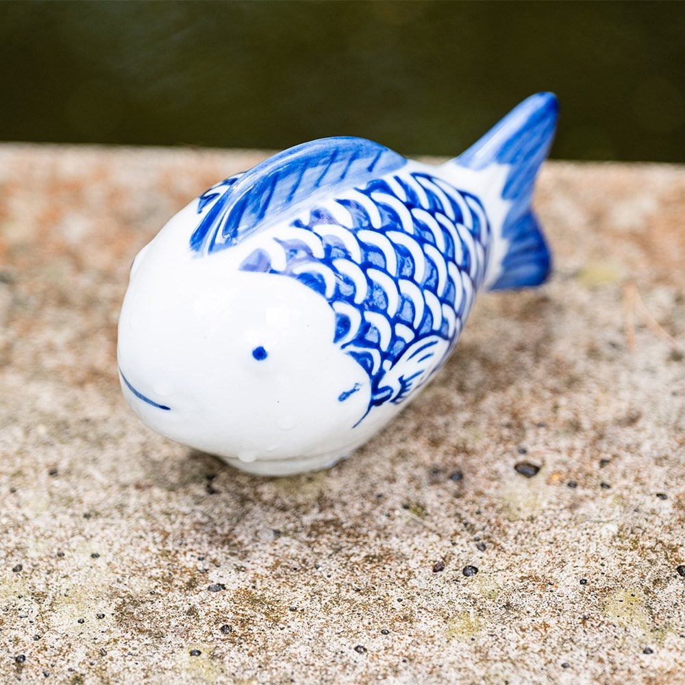 Pair of floating porcelain fish