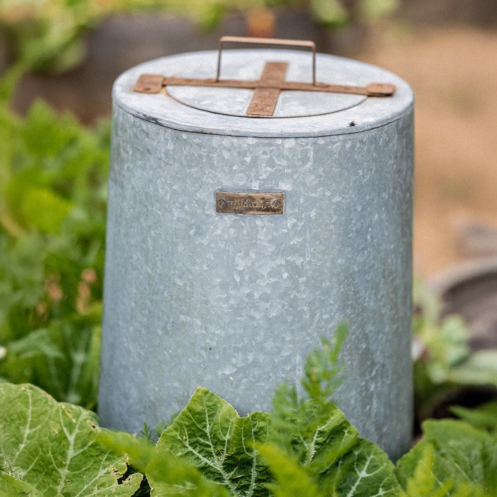 Composter with scoop