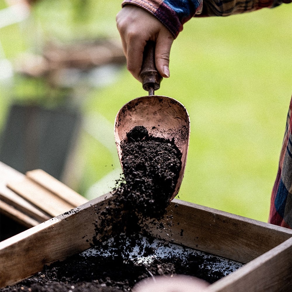 Copper hand compost scoop