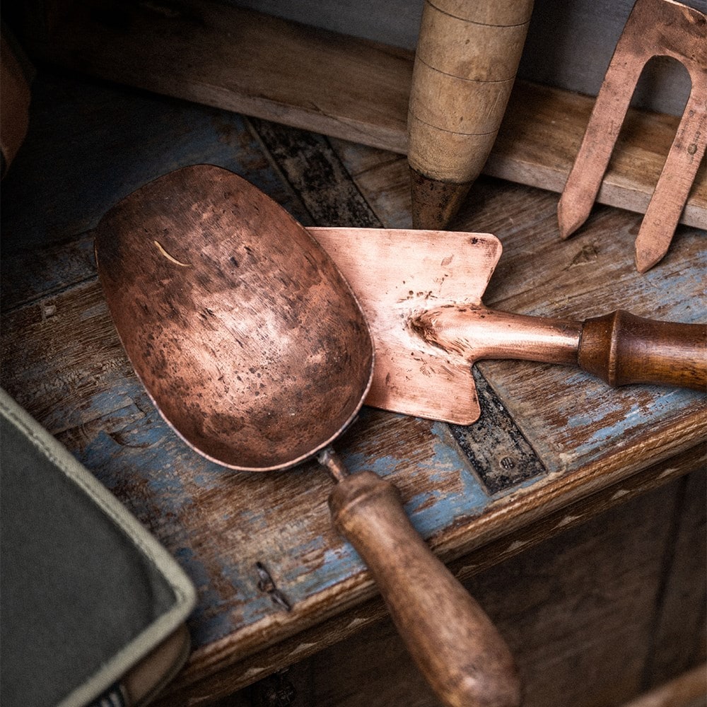 Copper hand compost scoop