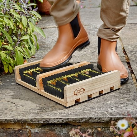 Wood and bristle boot brush