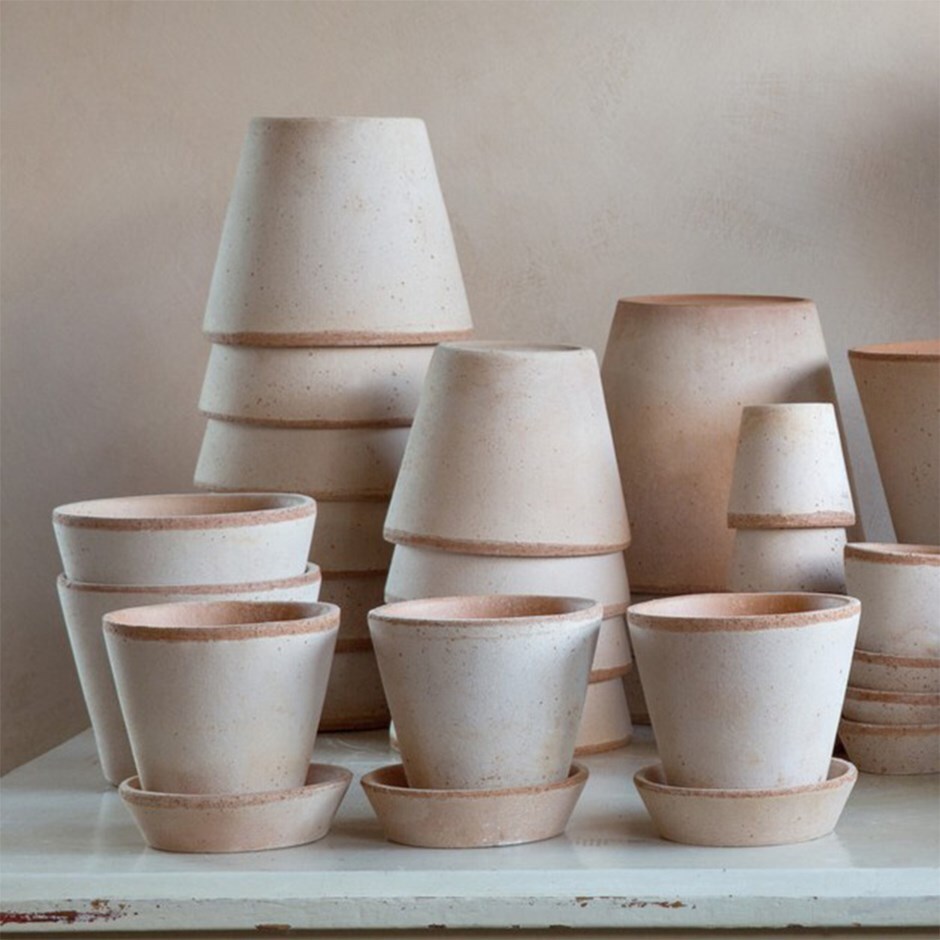 Simple terracotta plant pot with saucer 