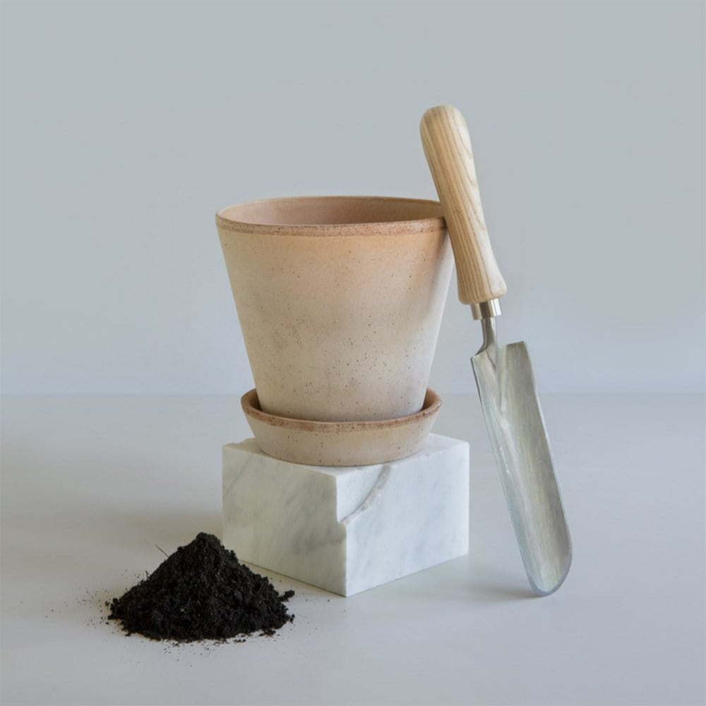 Simple terracotta plant pot with saucer 