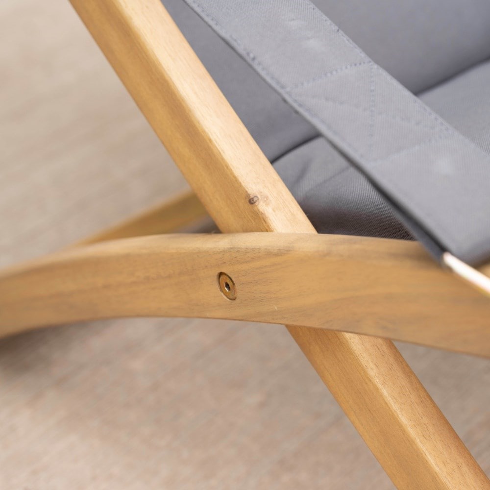 Grey padded deck chair