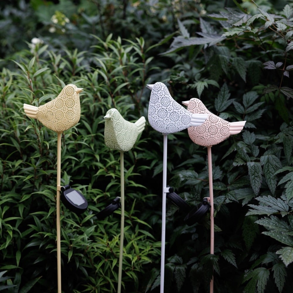 Set of four solar bird lights 