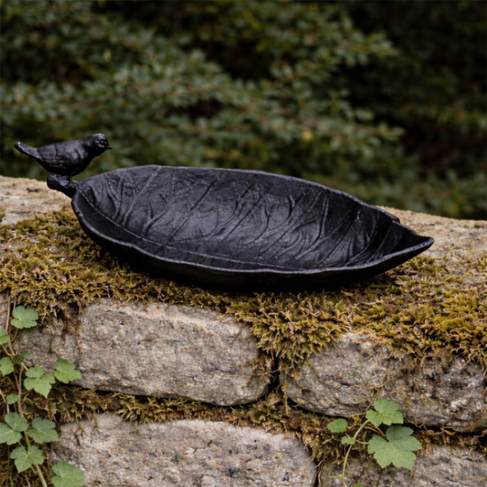 Cast iron leaf bird bath with bird