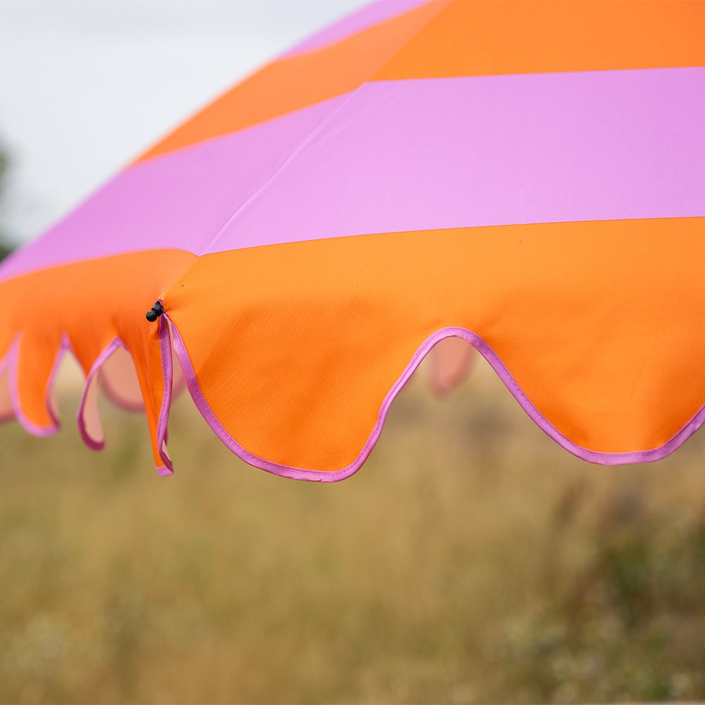 Pink orange stripe scallop edge parasol