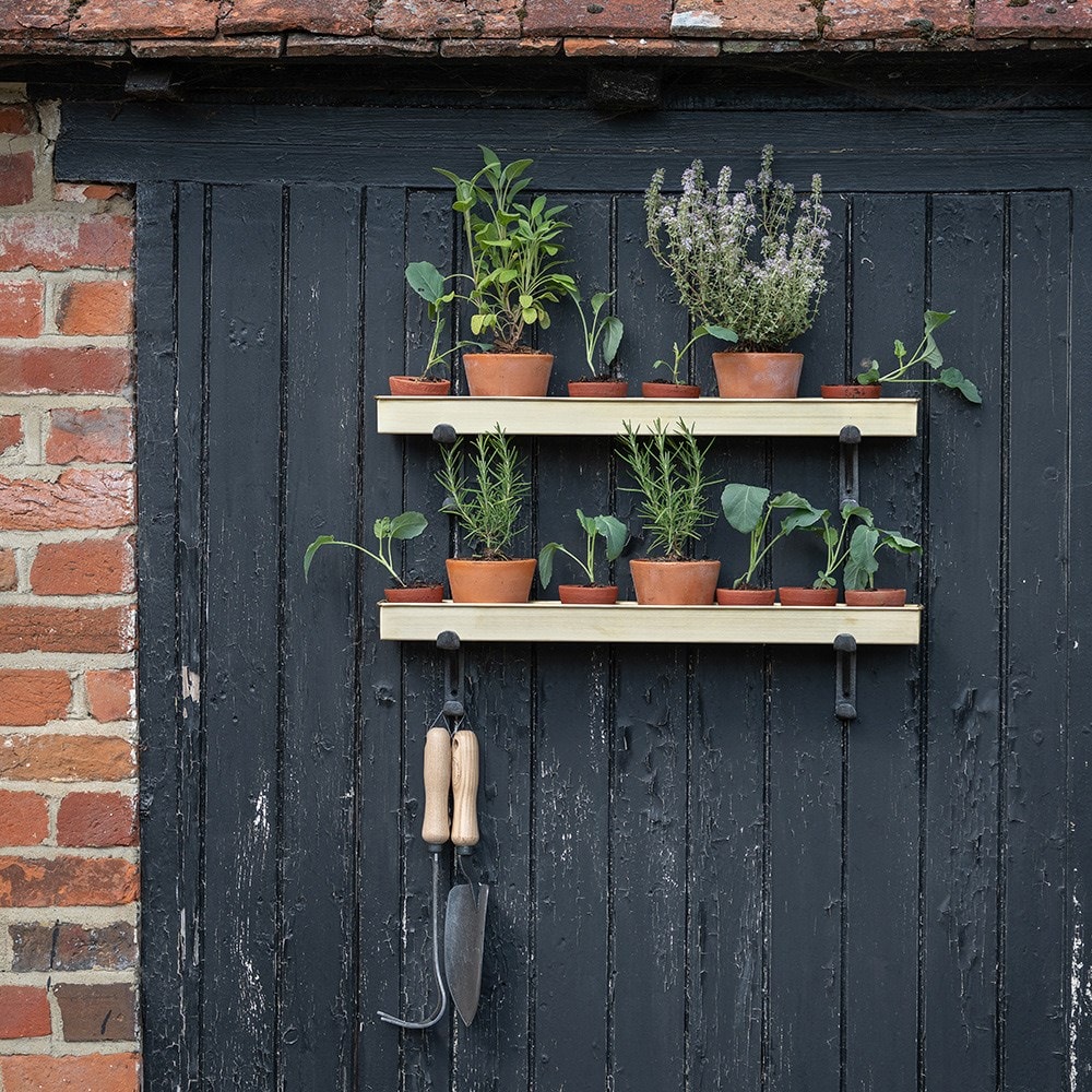 Brushed brass tray with wall brackets
