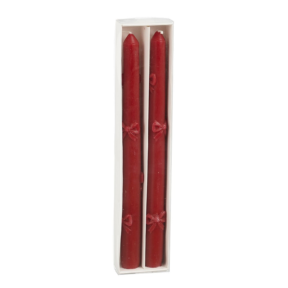 Two red bow dinner candles