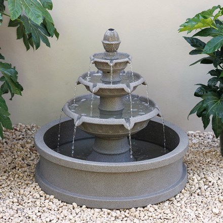 3 tiered fountain in low pool with lights